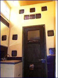 Sun filled/High Ceiling Bathroom With Blue Glass Blocks